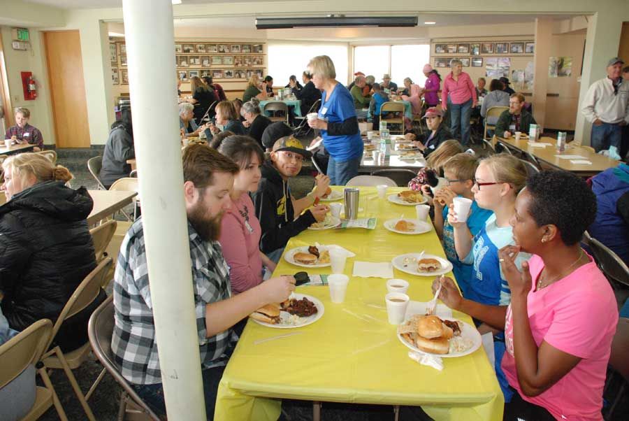 Gathering in the church basement for a BBQ lunch